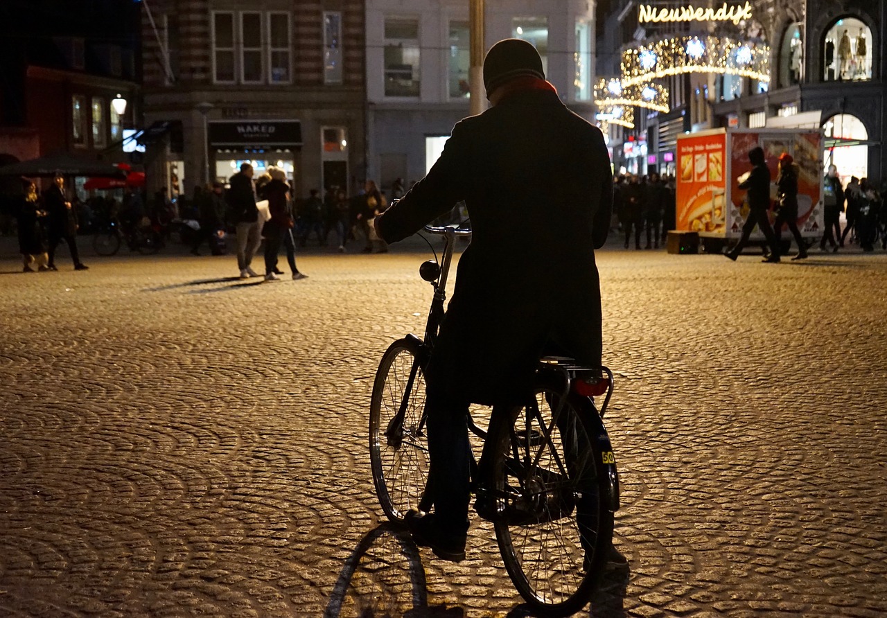 cyclists  street scene  city free photo