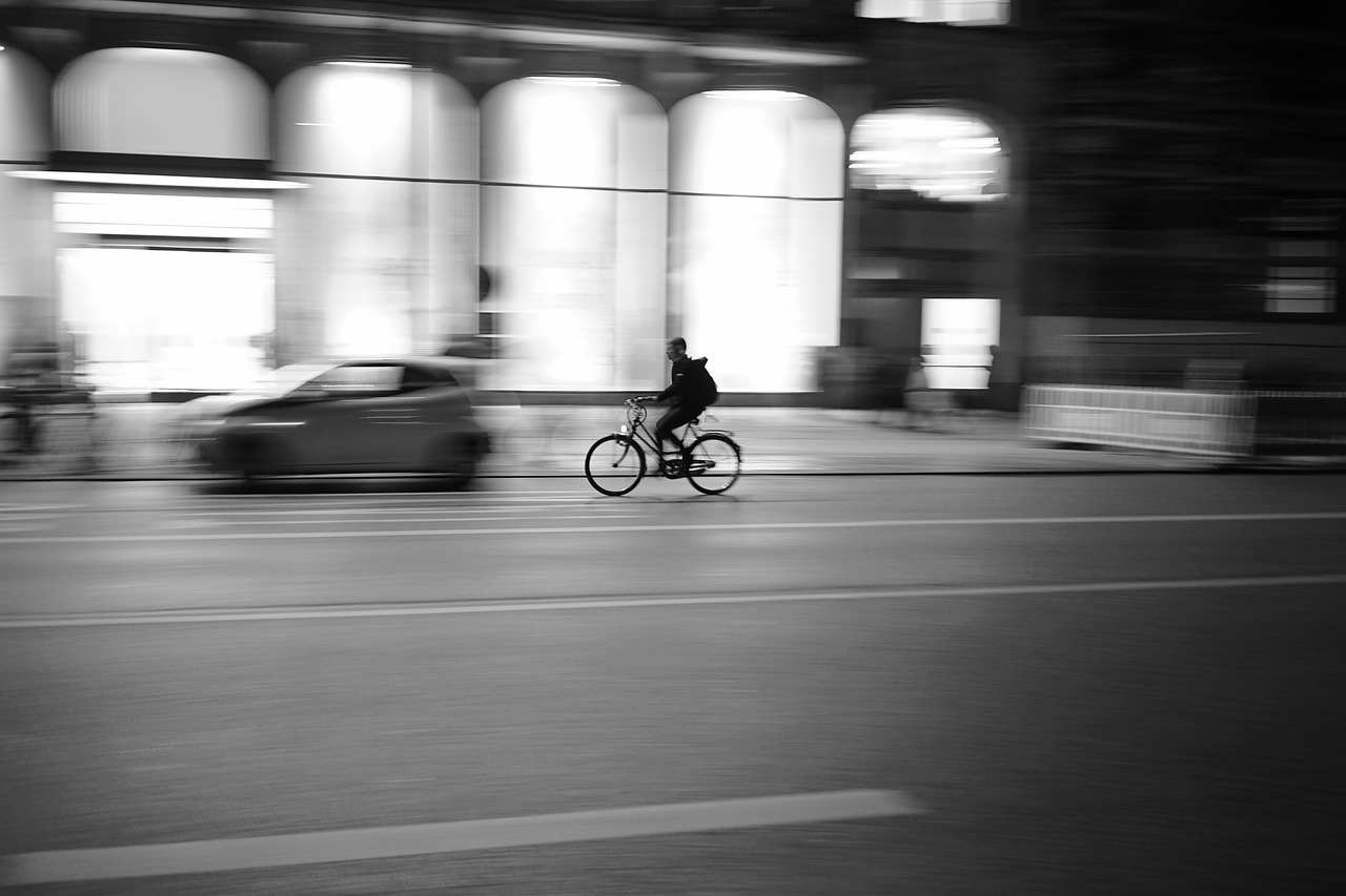 cyclists  city  street photography free photo