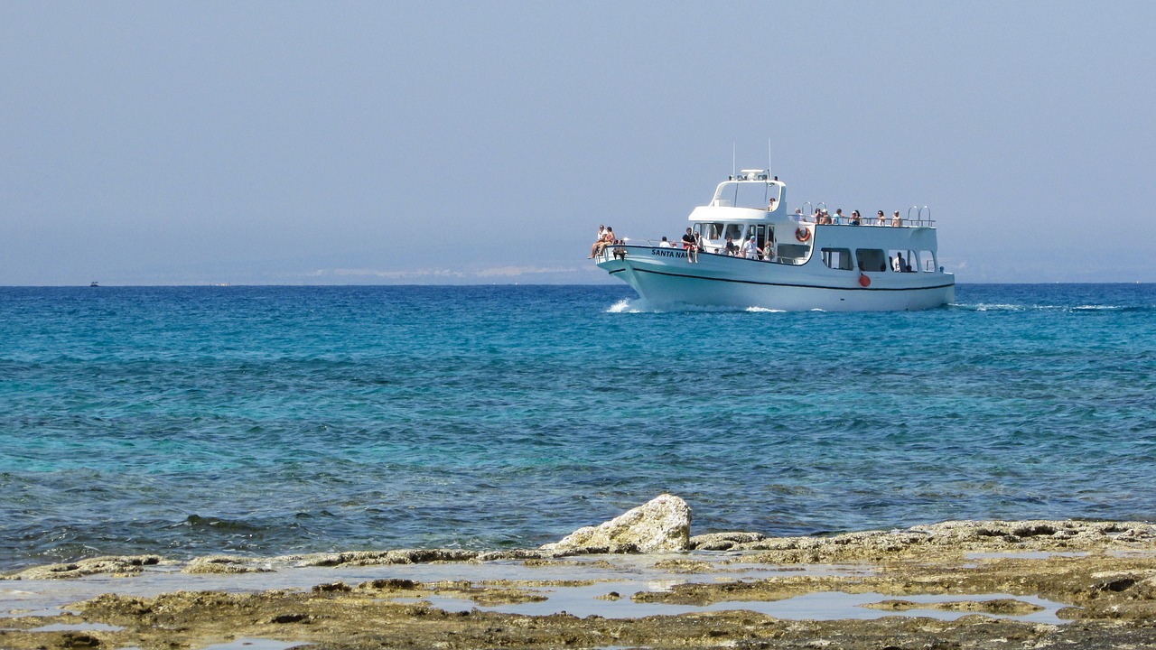 cyprus rocky coast boat free photo