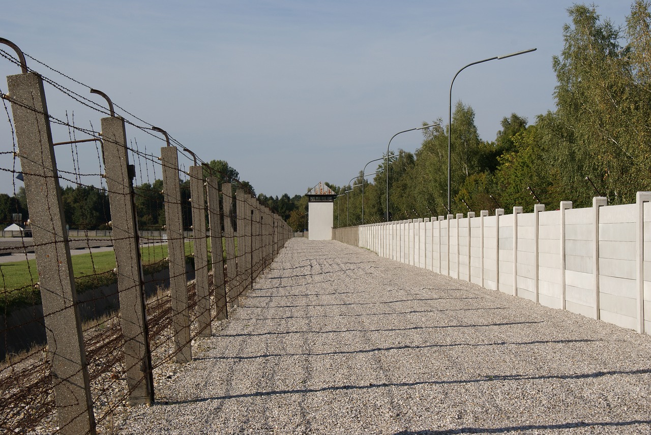 dachau concentration camp walls fence free photo