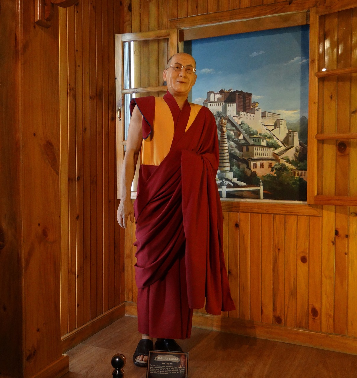 dalai lama statue wax free photo