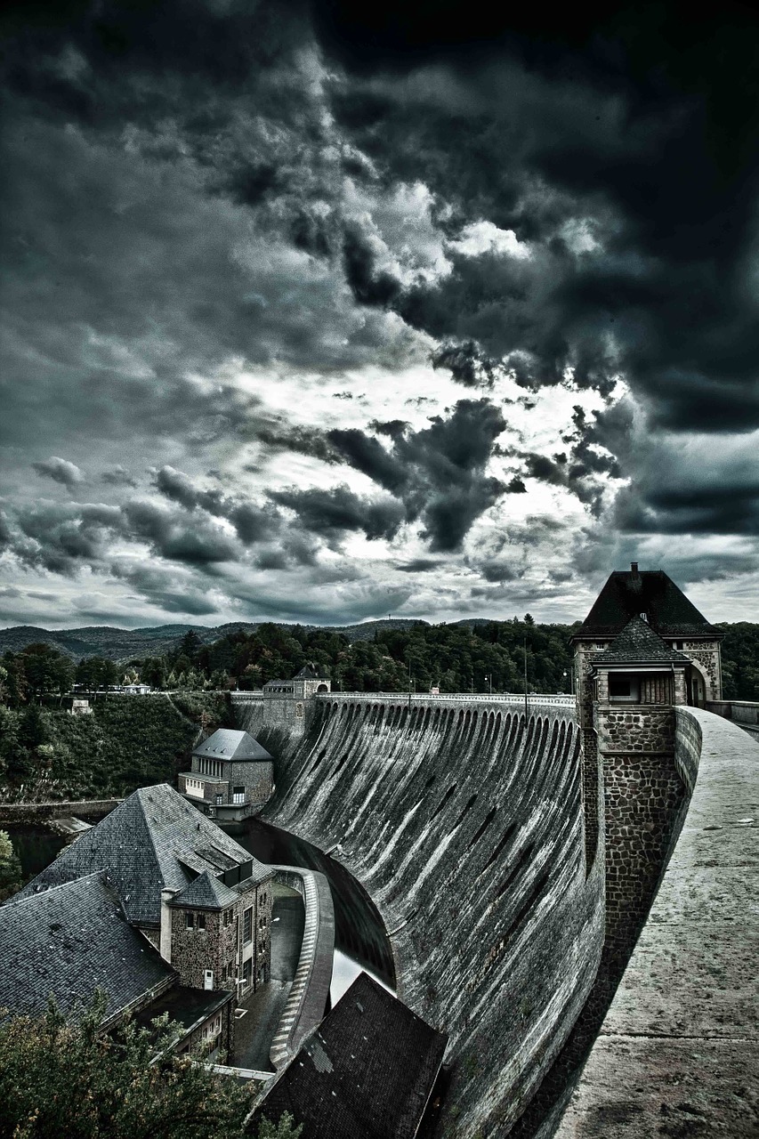 dam stone wall sky free photo