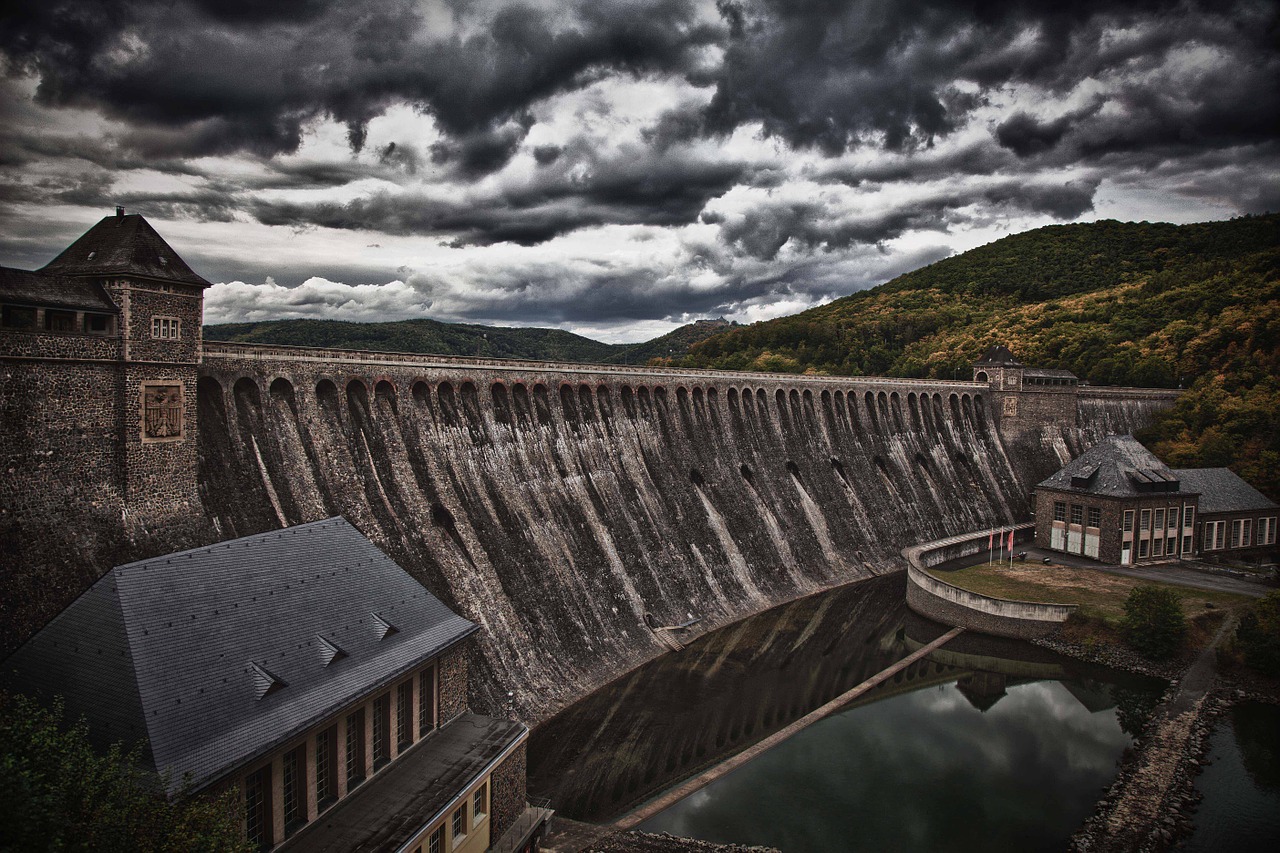 dam stone wall sky free photo