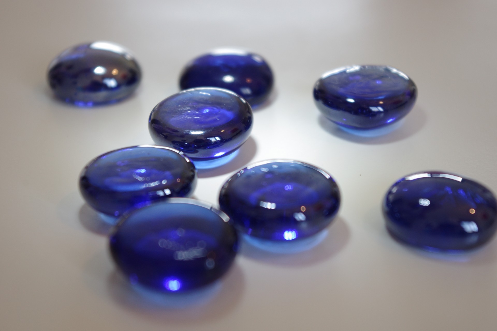 blue glass pebbles free photo