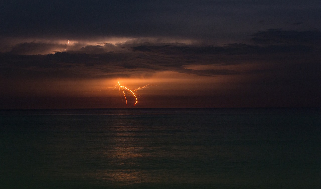 dark clouds horizon lightning free photo