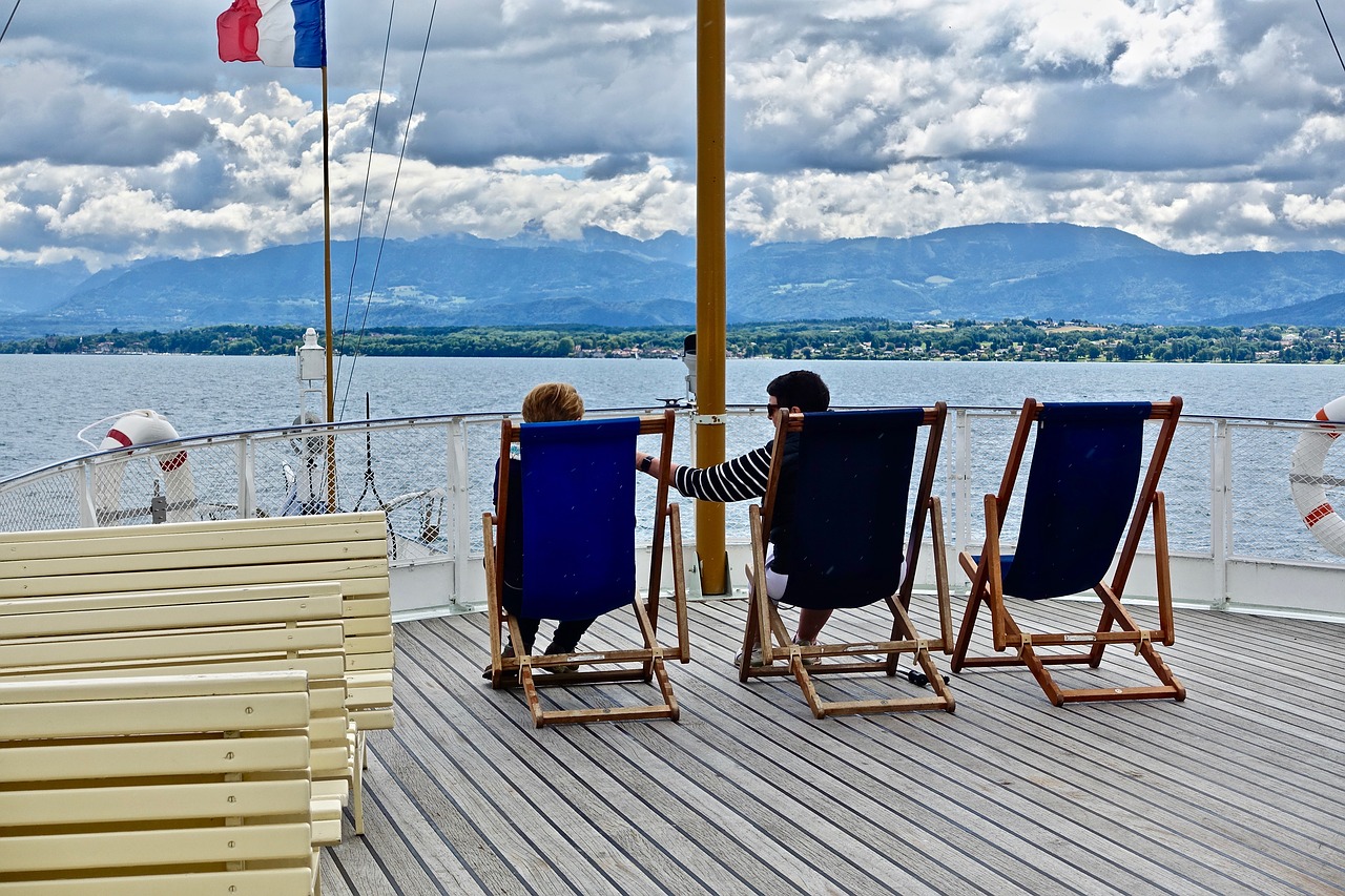 deck chairs  people  sea free photo