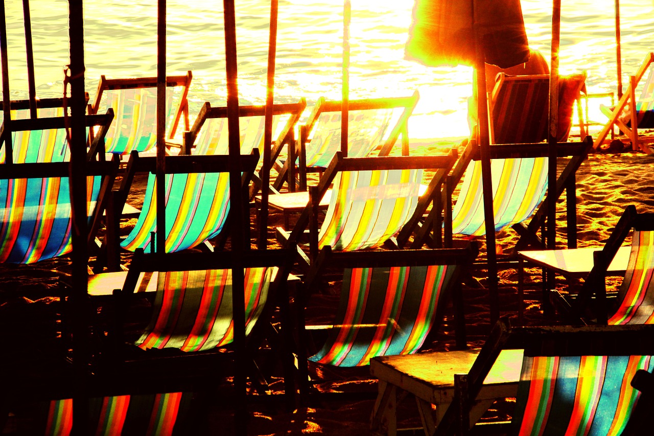 deckchairs seats beach free photo