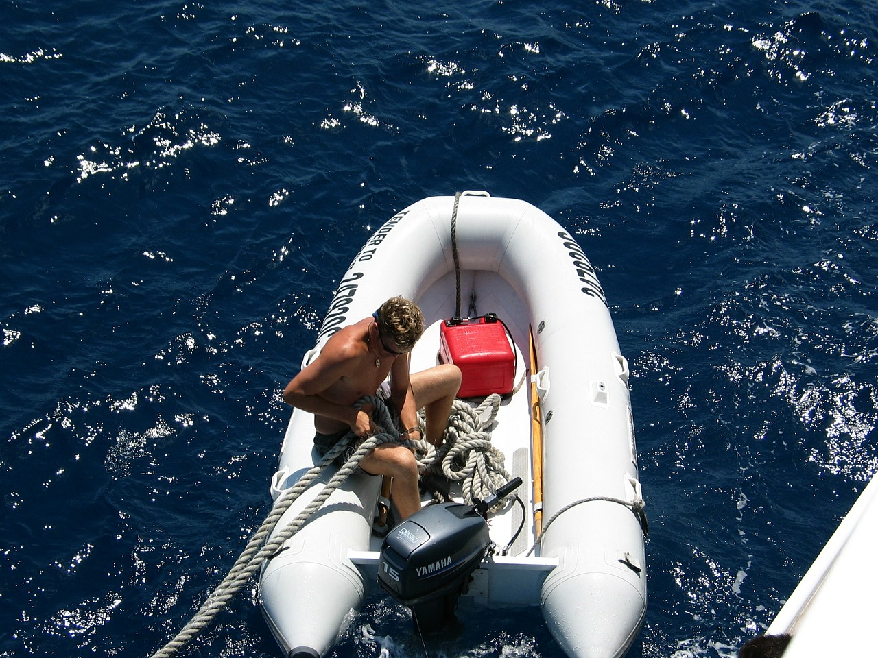 dinghy man person free photo