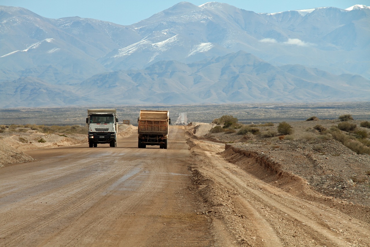 dirt road trucks mountains free photo
