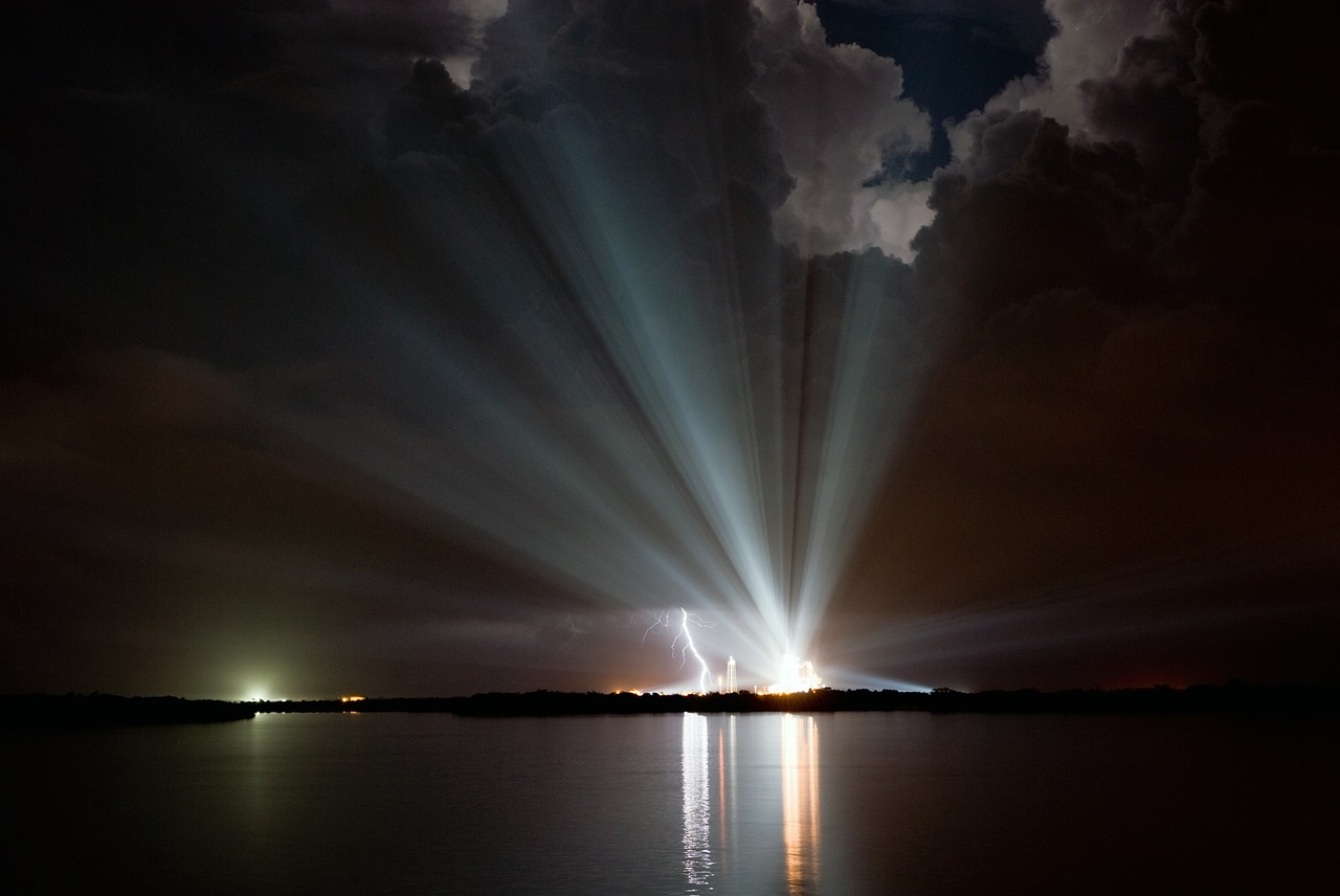 discovery space shuttle lightning clouds free photo