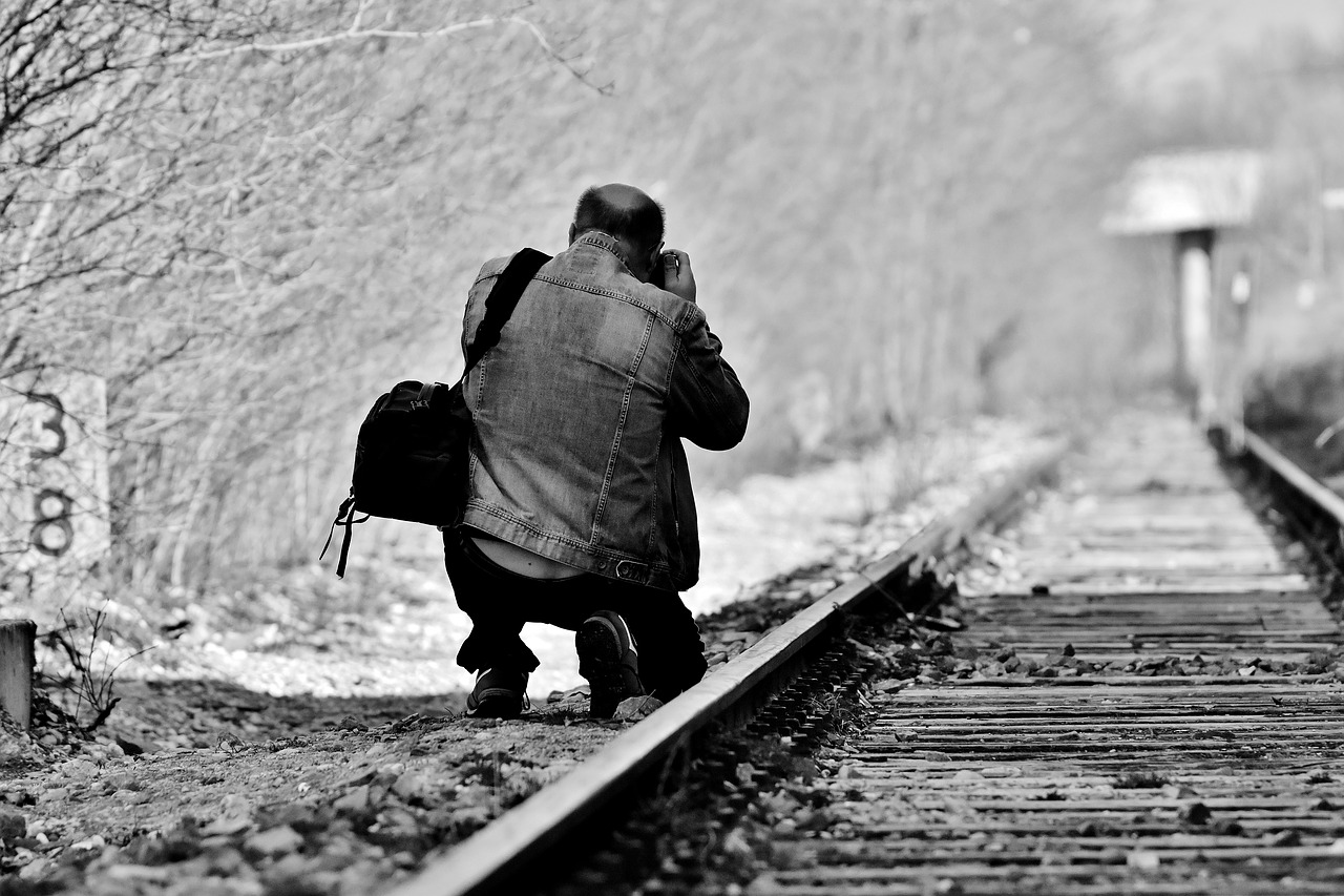 disused railway line  railway station  man free photo