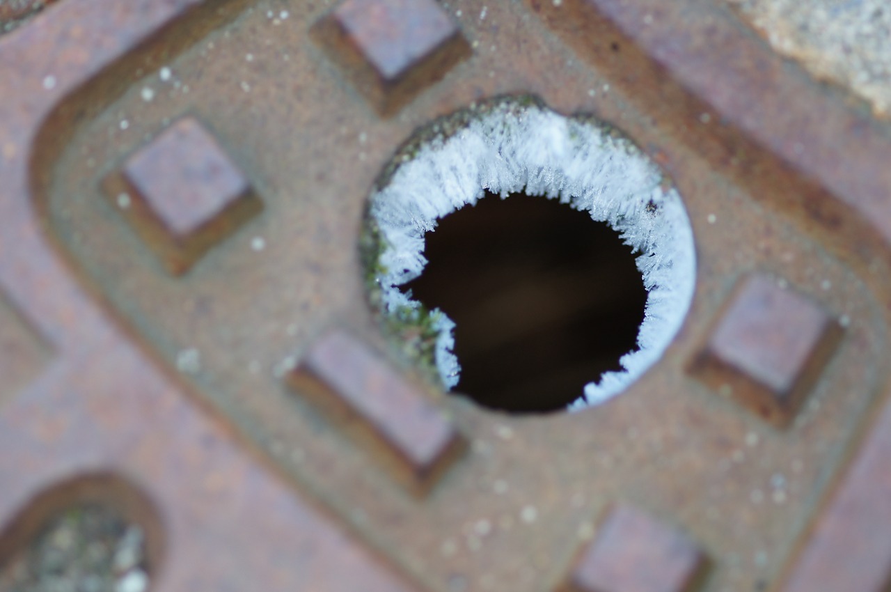 drain iced winter free photo