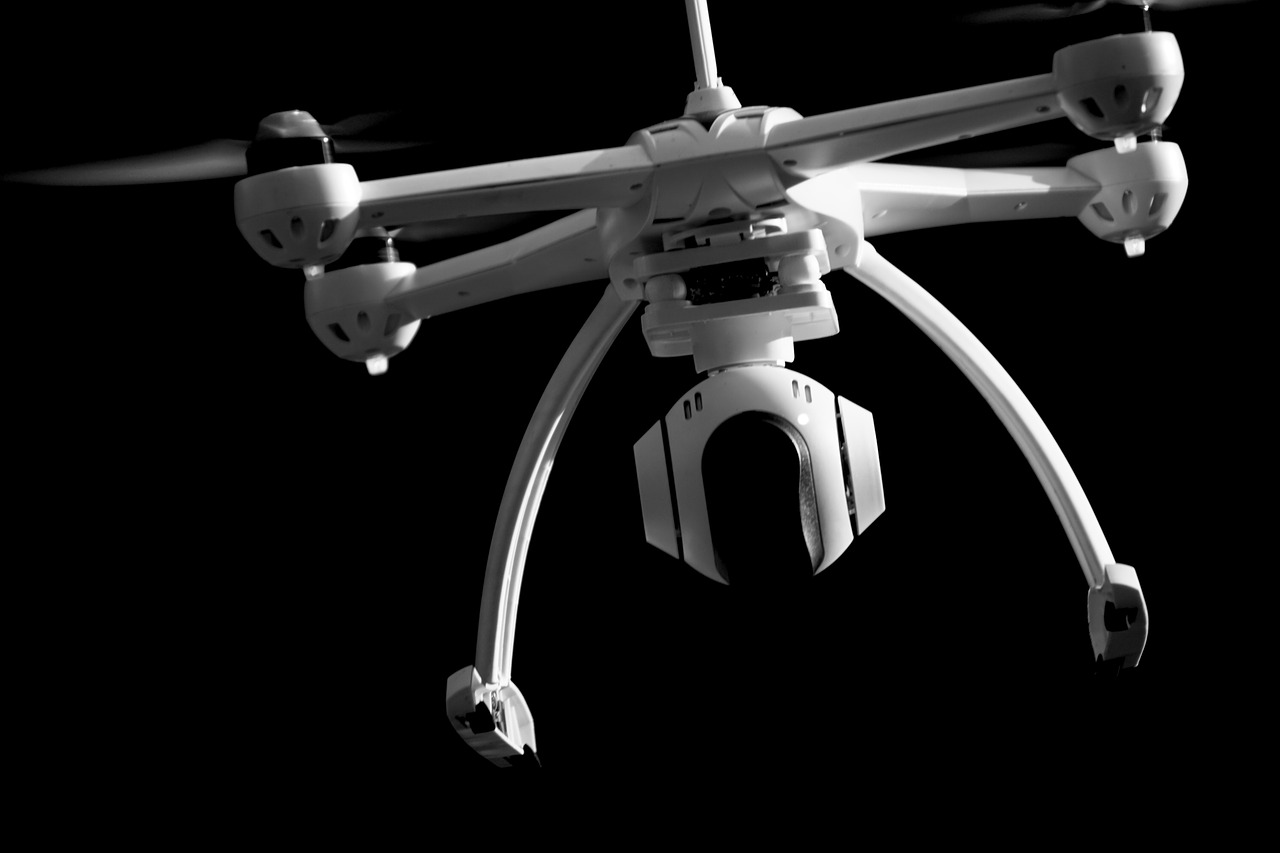 drone quadrocopter black and white free photo