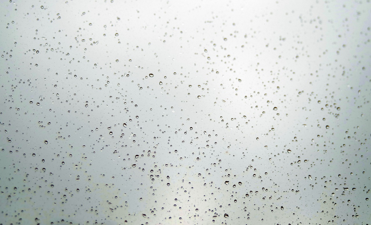 drops on the glass pane rain free photo