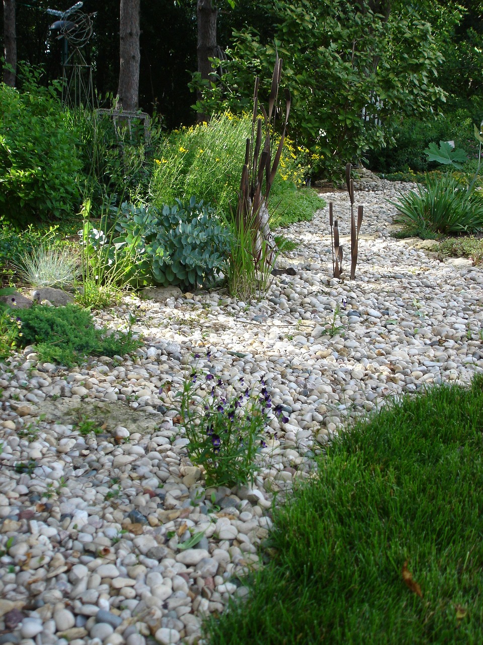 dry creek bed garden rocks free photo