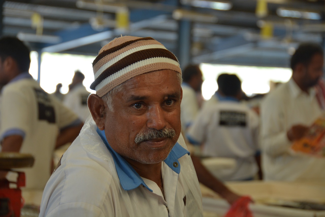 dubai fish market workers free photo