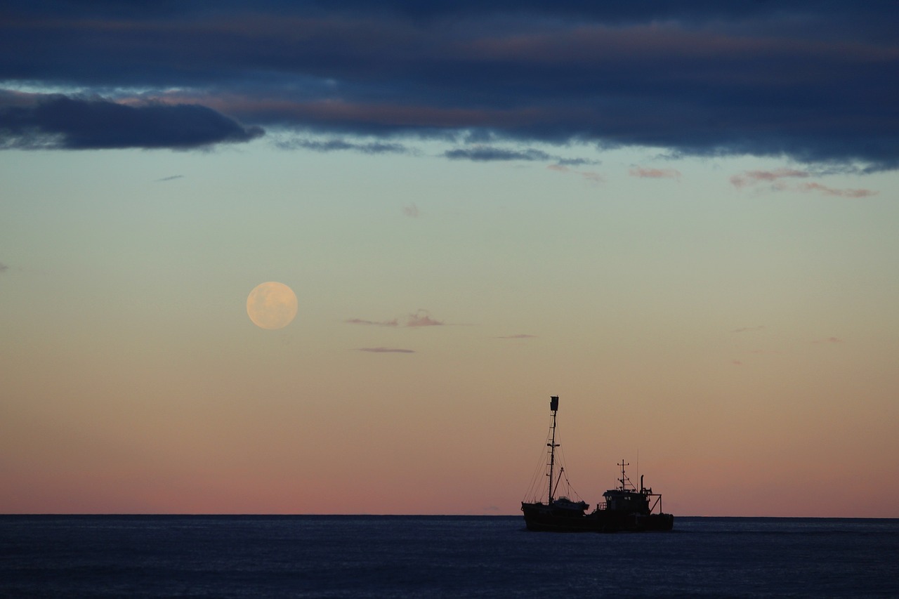 dusk ocean boat free photo