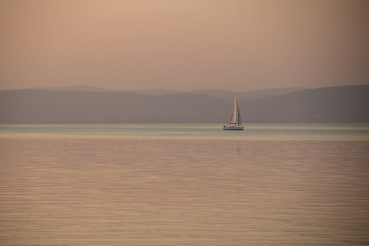 dusk  water  sailing free photo