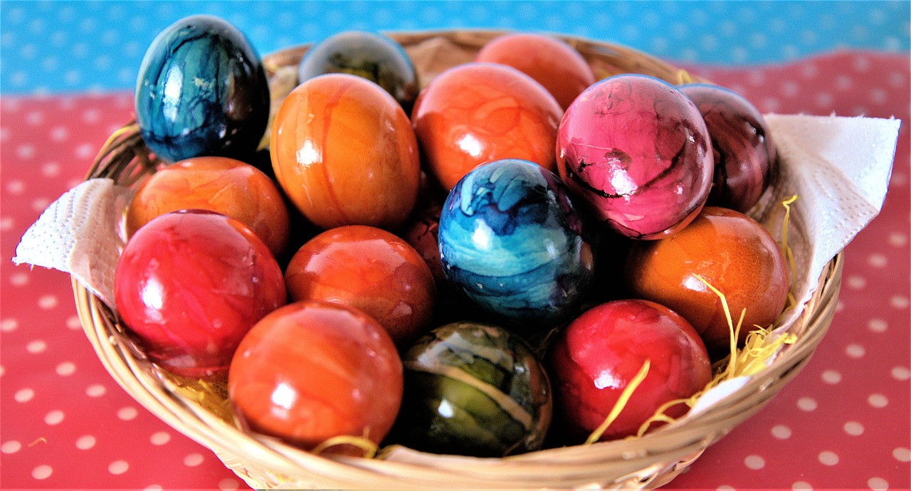 easter basket with colorful eggs  blue  basket free photo