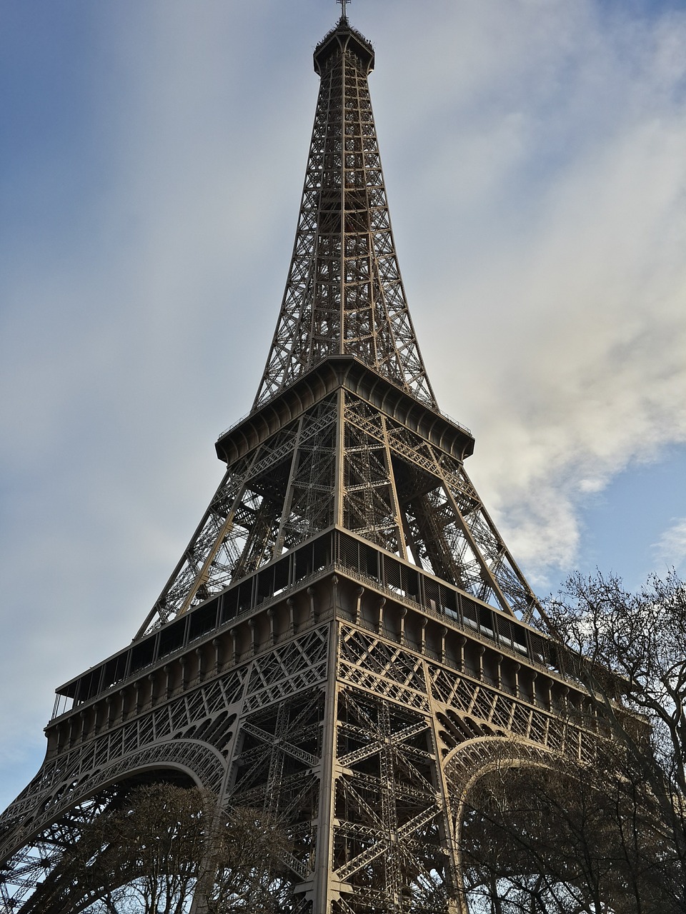 eiffel tower wrought iron lattice tower champ de mars free photo