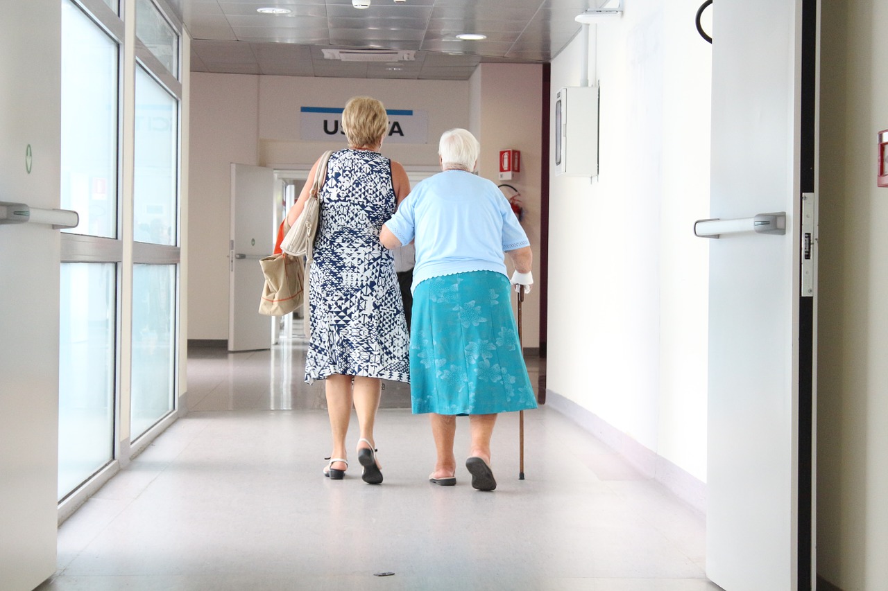 elderly corridor doctor free photo