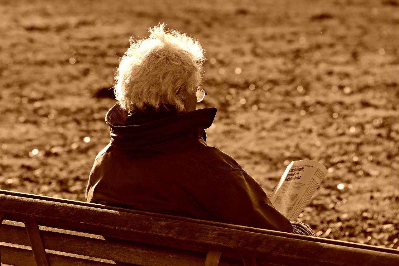 elderly man  person  sitting free photo