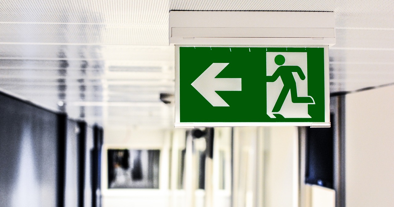 emergency exit exit sign free photo