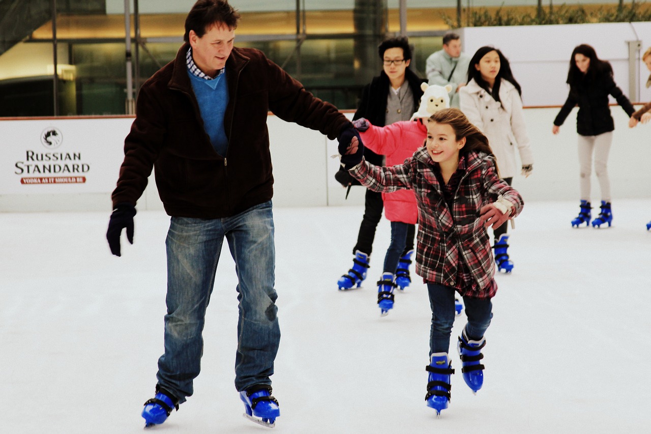 skates ice father and daughter free photo