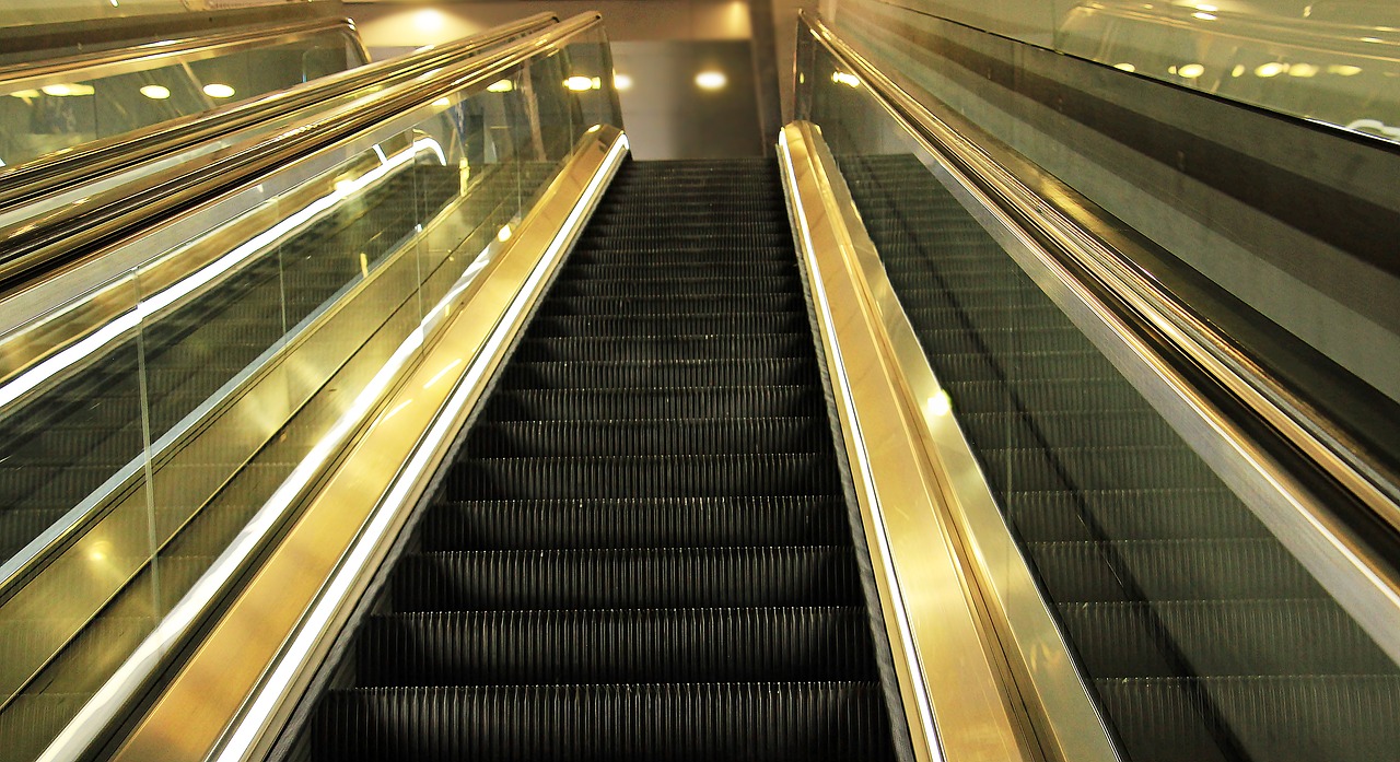 escalator mirroring upward free photo