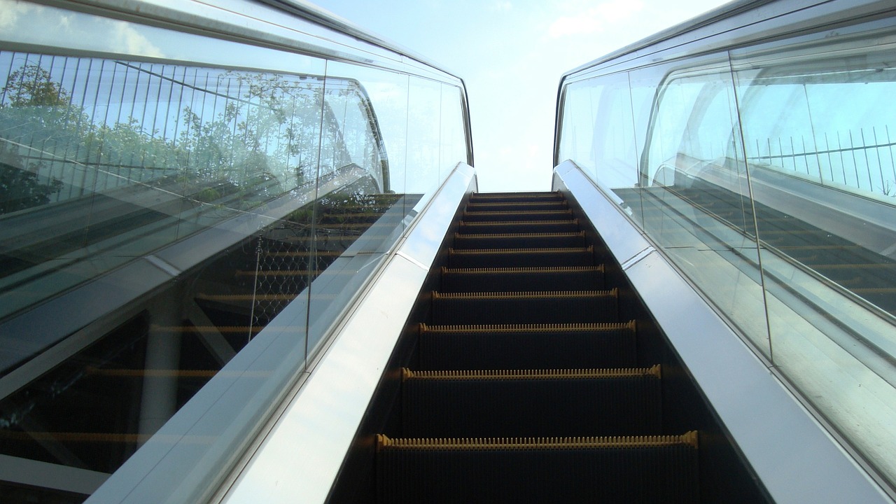 escalator metal sky free photo