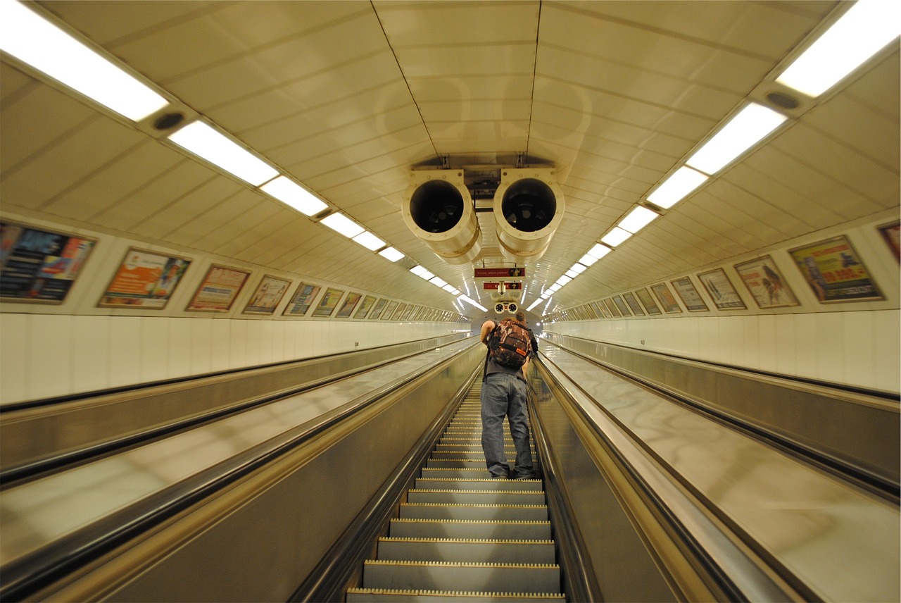 escalator subway station guy free photo