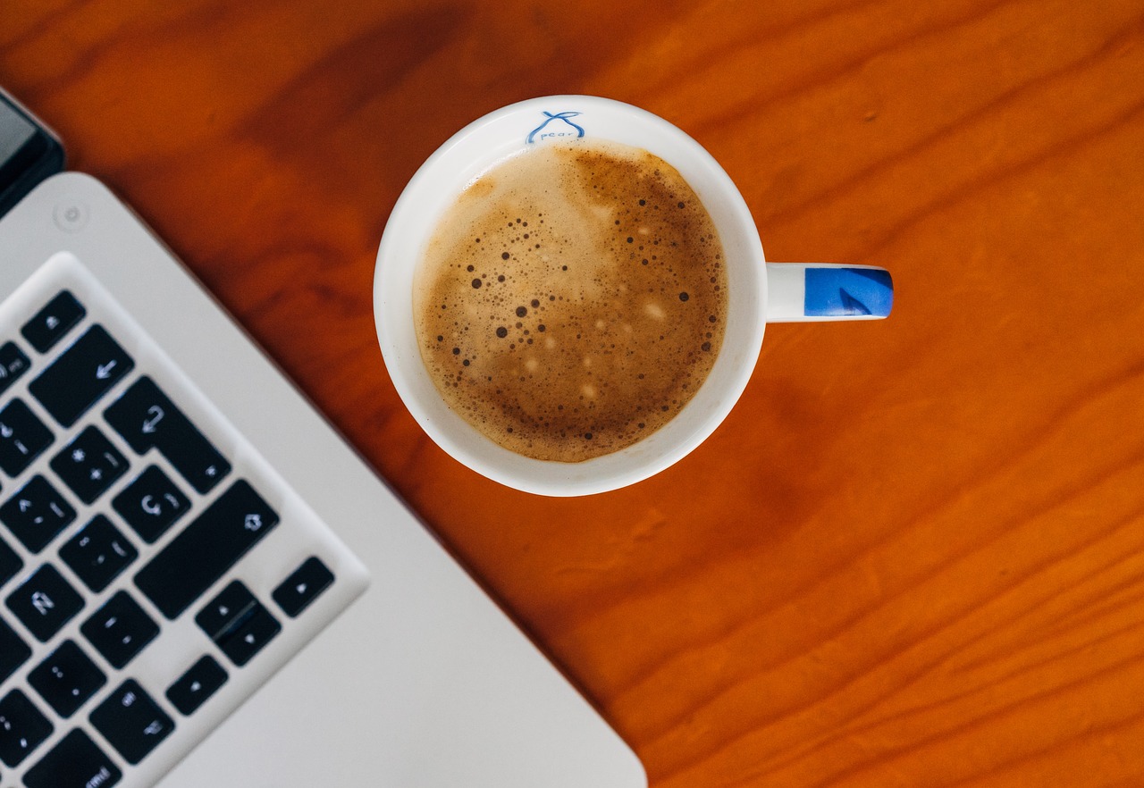 MacBook Computer & Espresso Coffee Royalty Free Stock Photo