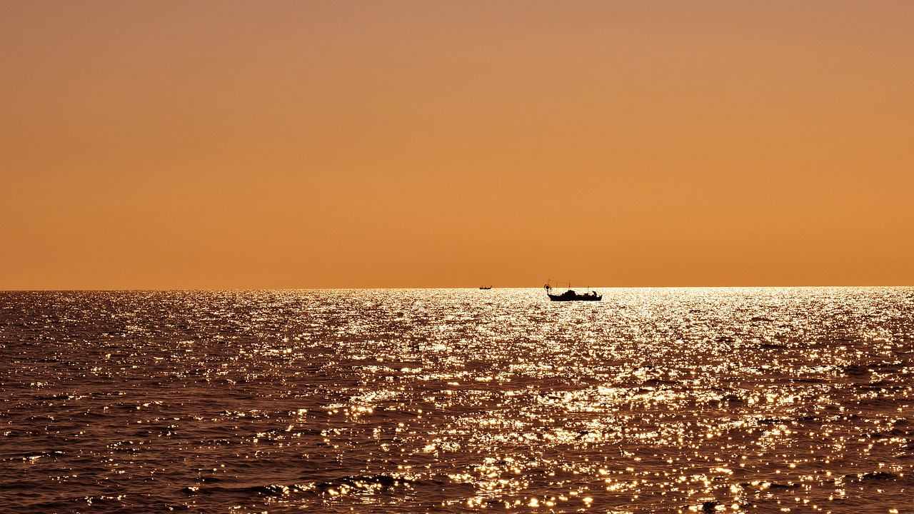 evening sea boats free photo