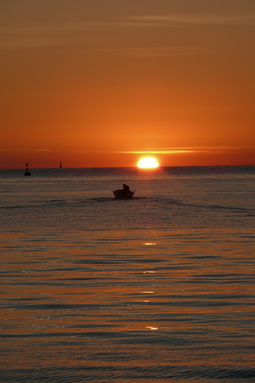 evening  fisherman  sunset free photo