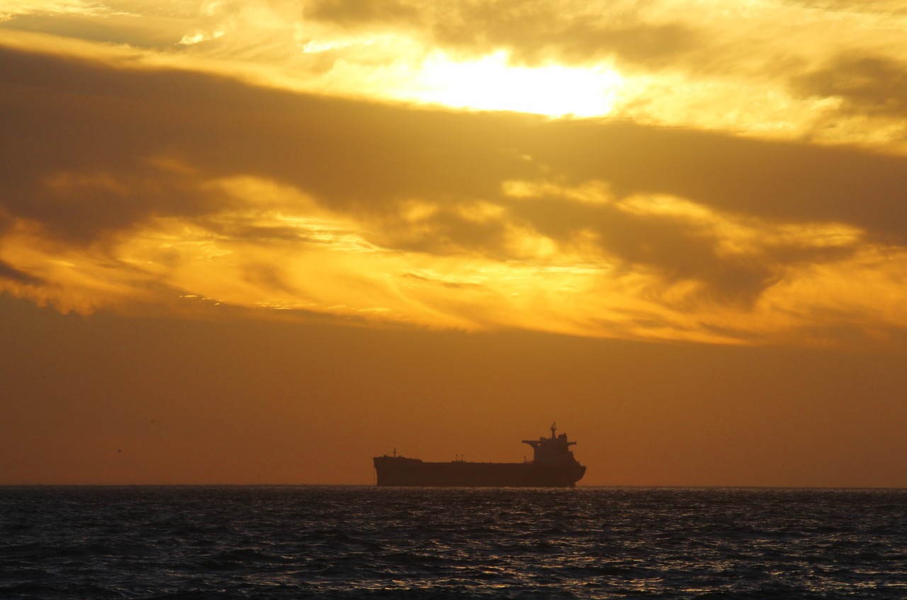 evening sky container ship sea free photo