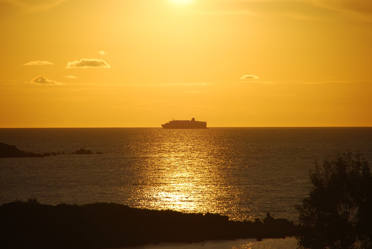 evening sun sea ship free photo