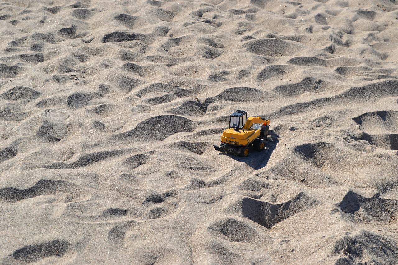 excavator toy sand free photo