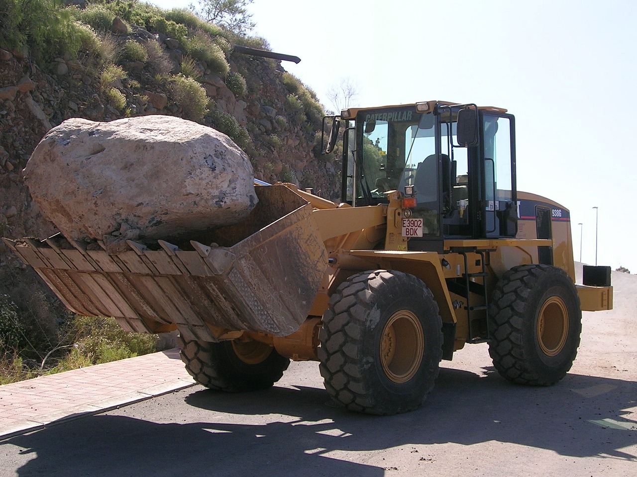 excavator stone rock free photo