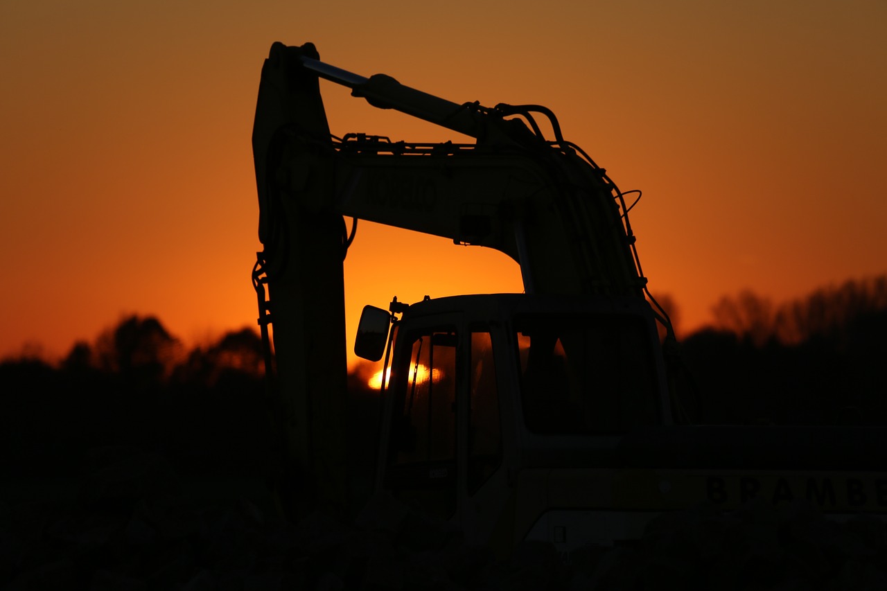 excavators construction machine evening free photo