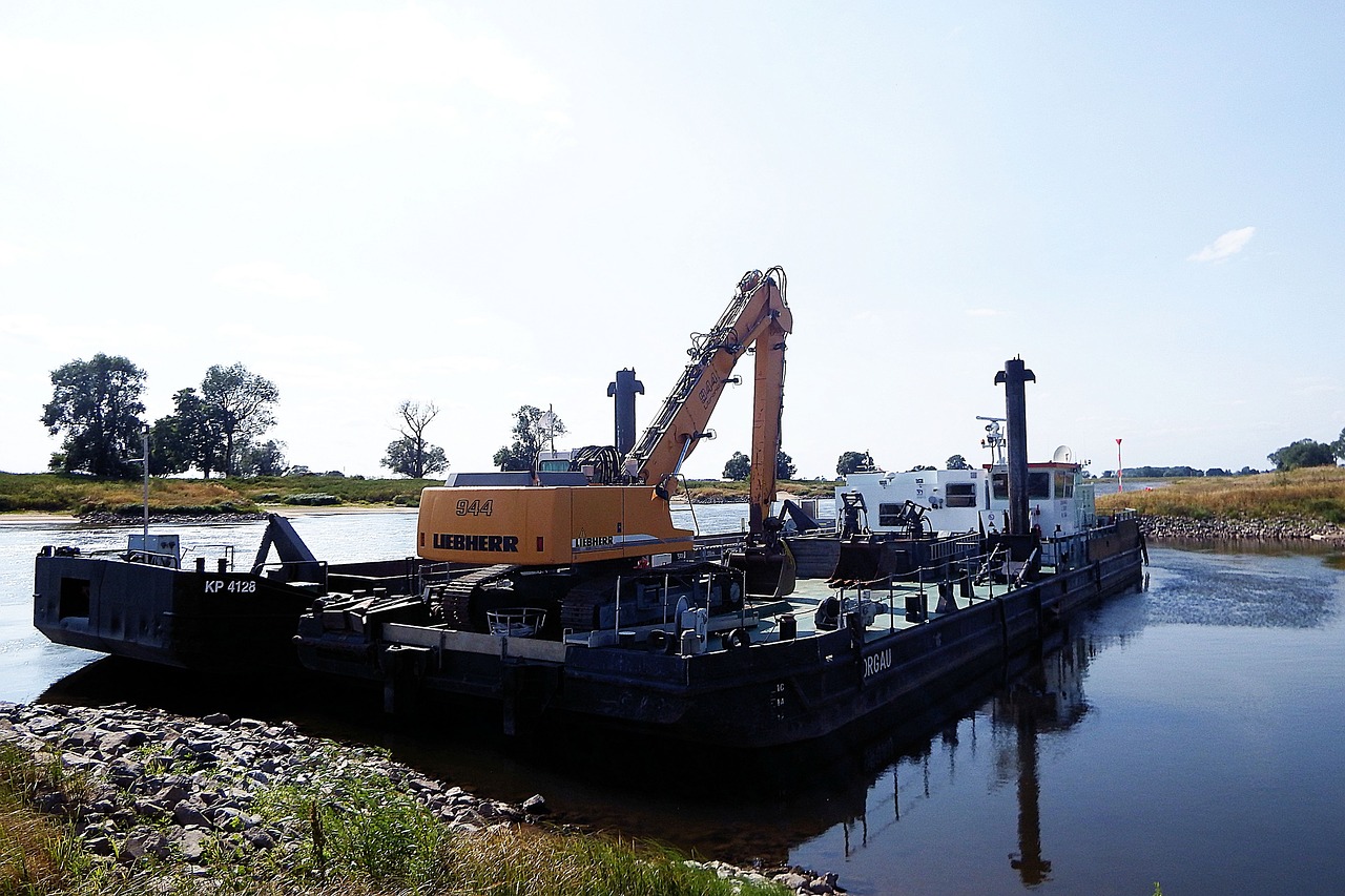 excavators barges river free photo