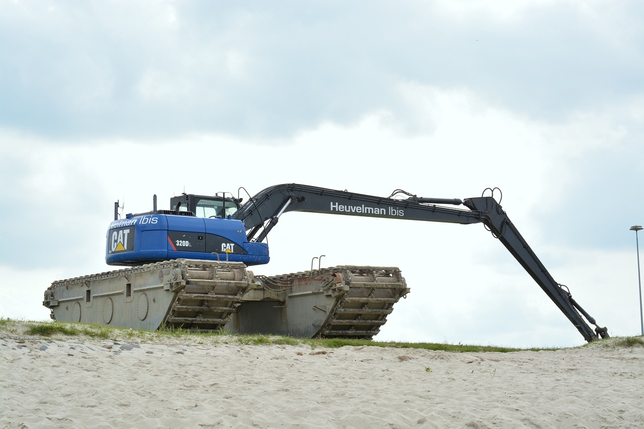 excavators beach construction machine free photo