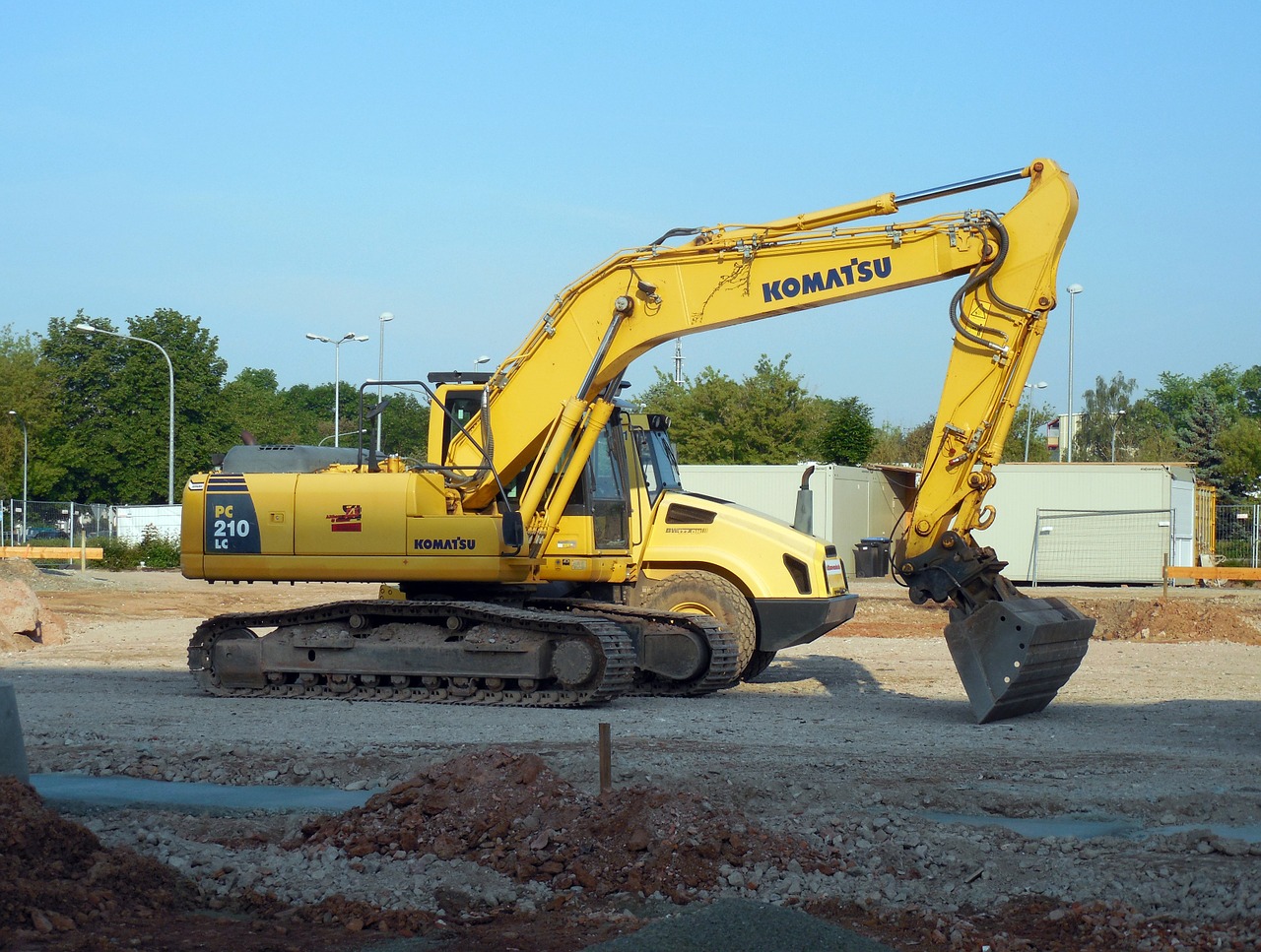 excavators construction vehicle site free photo