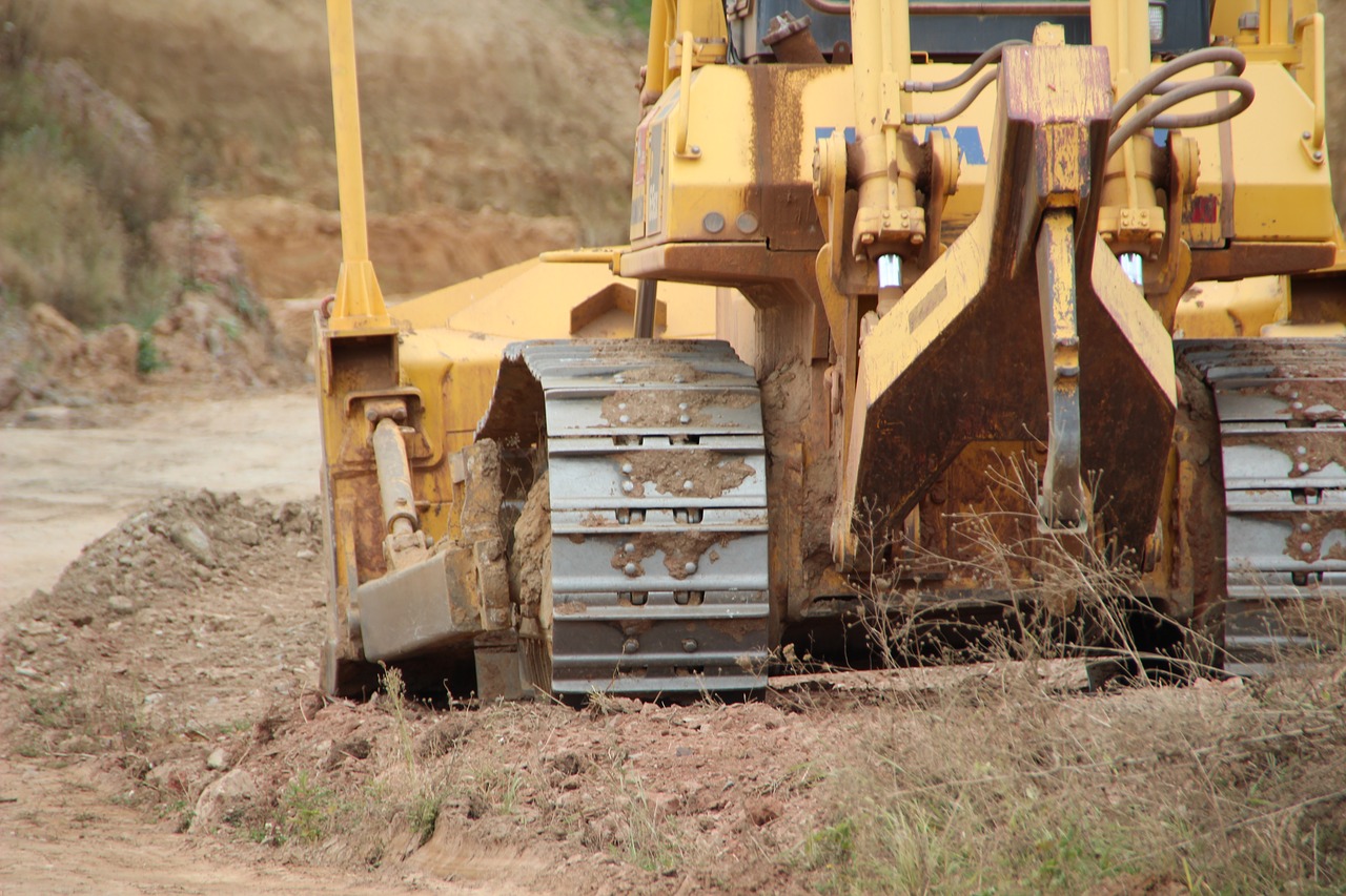 excavators site construction vehicle free photo