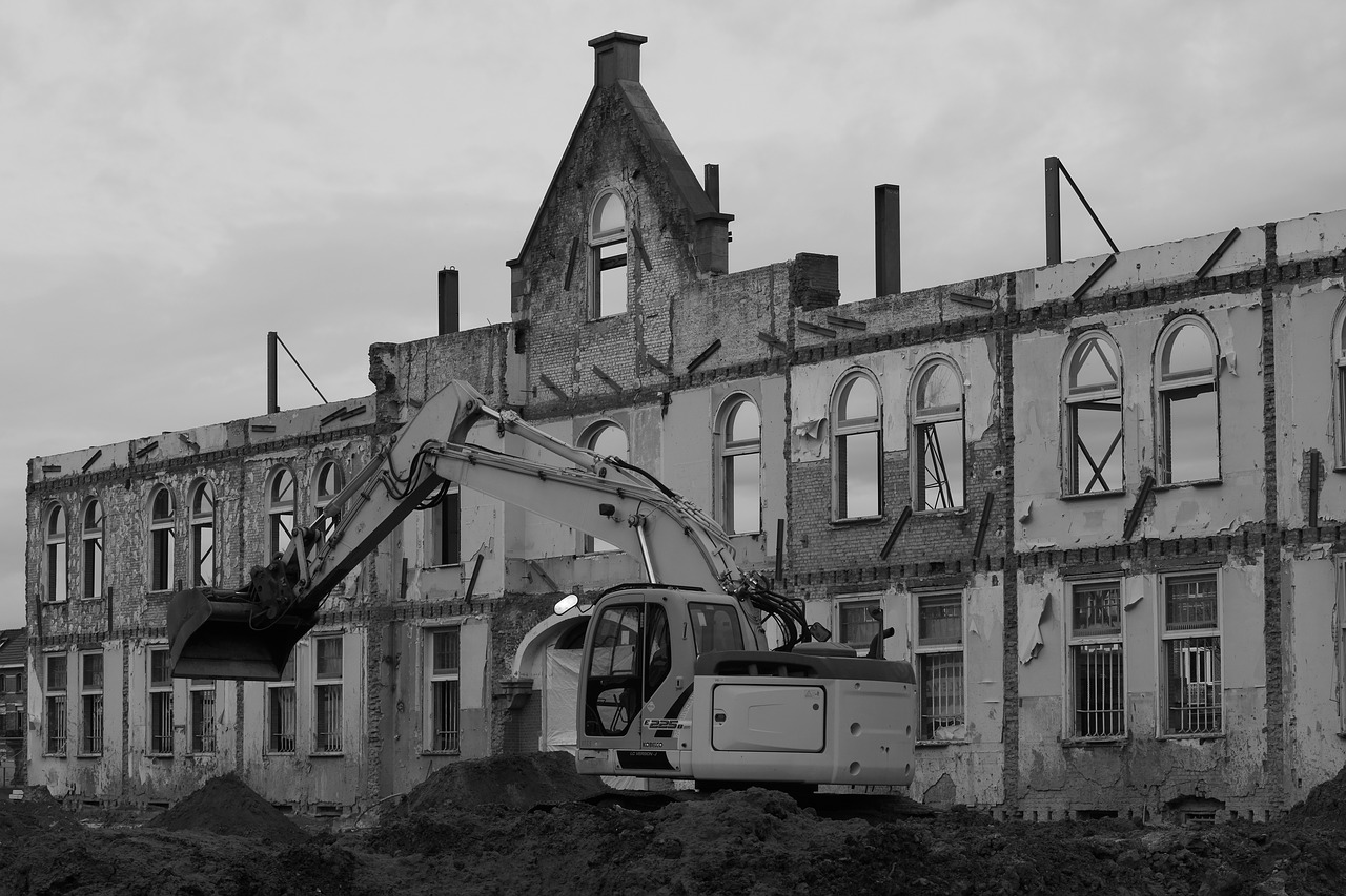 excavators dig facade free photo