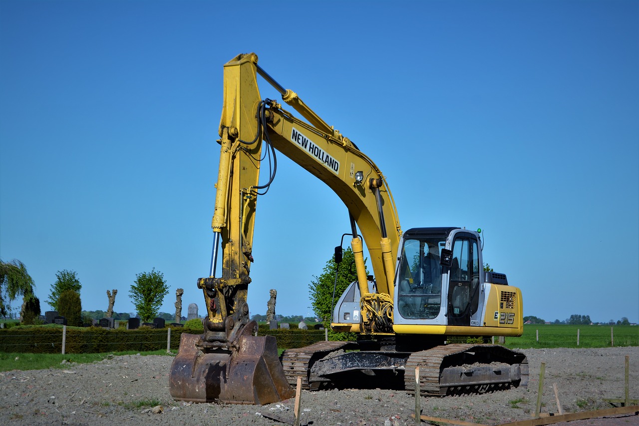 excavators  new holland  site free photo
