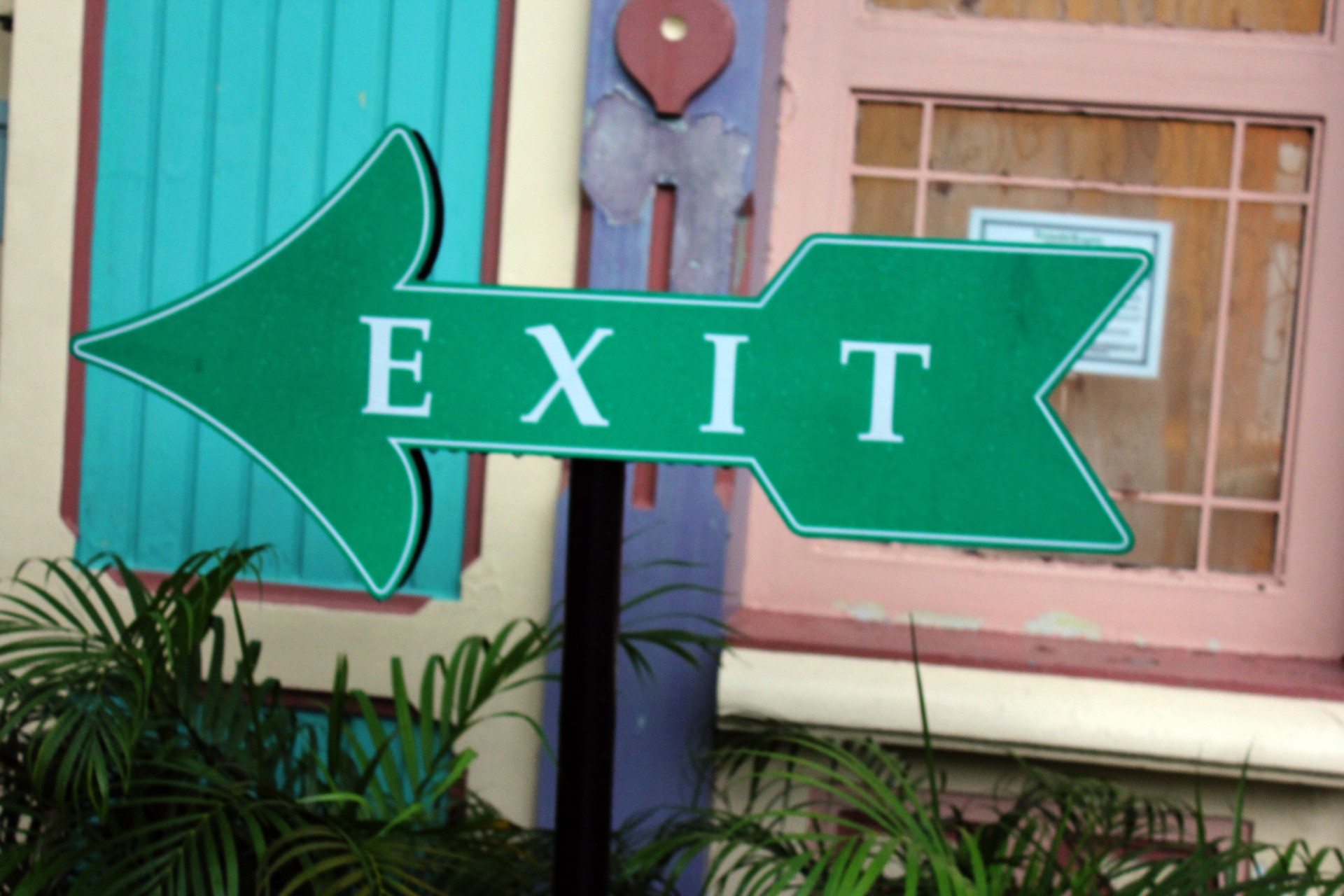 exit sign arrow symbol free photo
