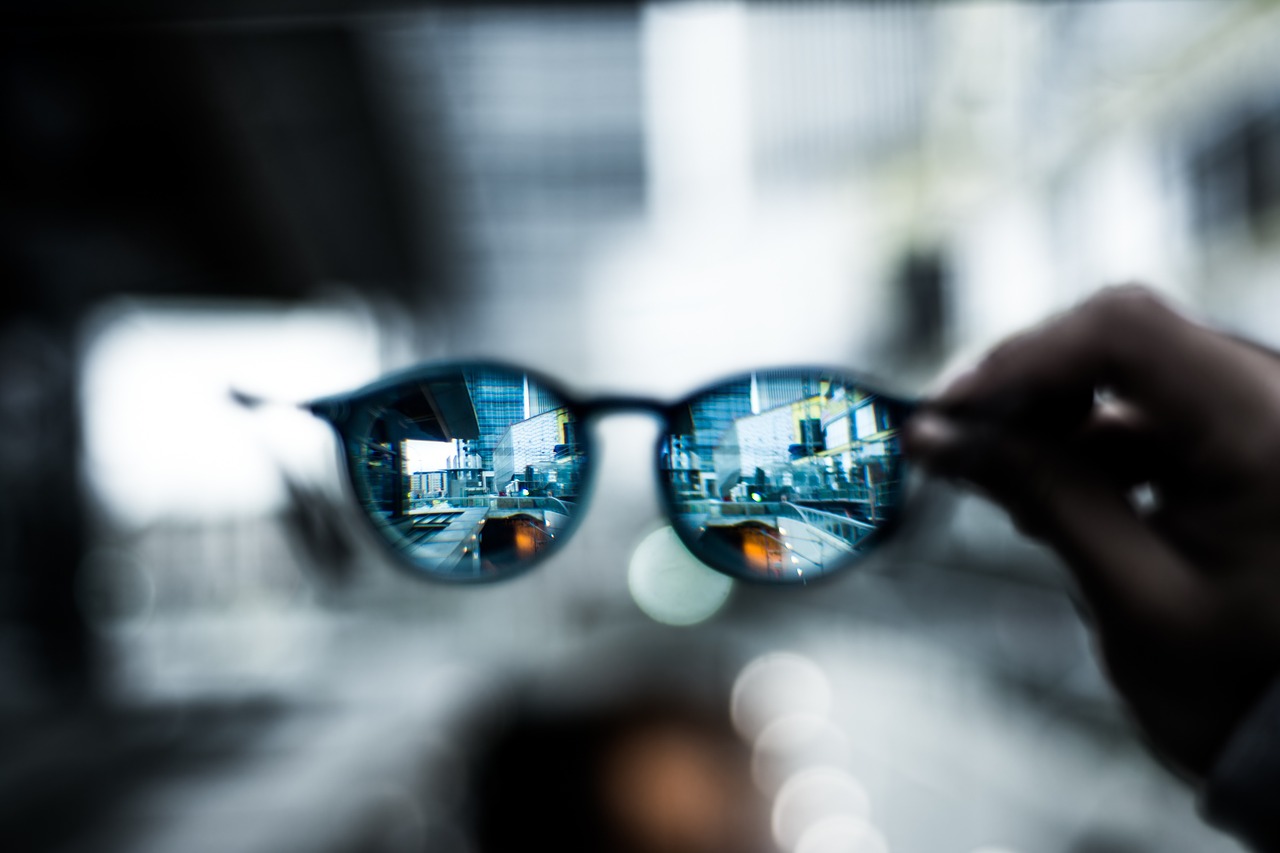 eyeglass hand bokeh free photo