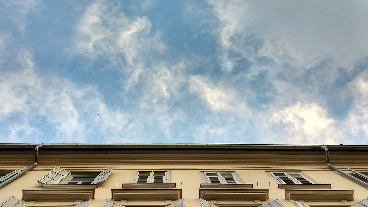 facade sky clouds free photo