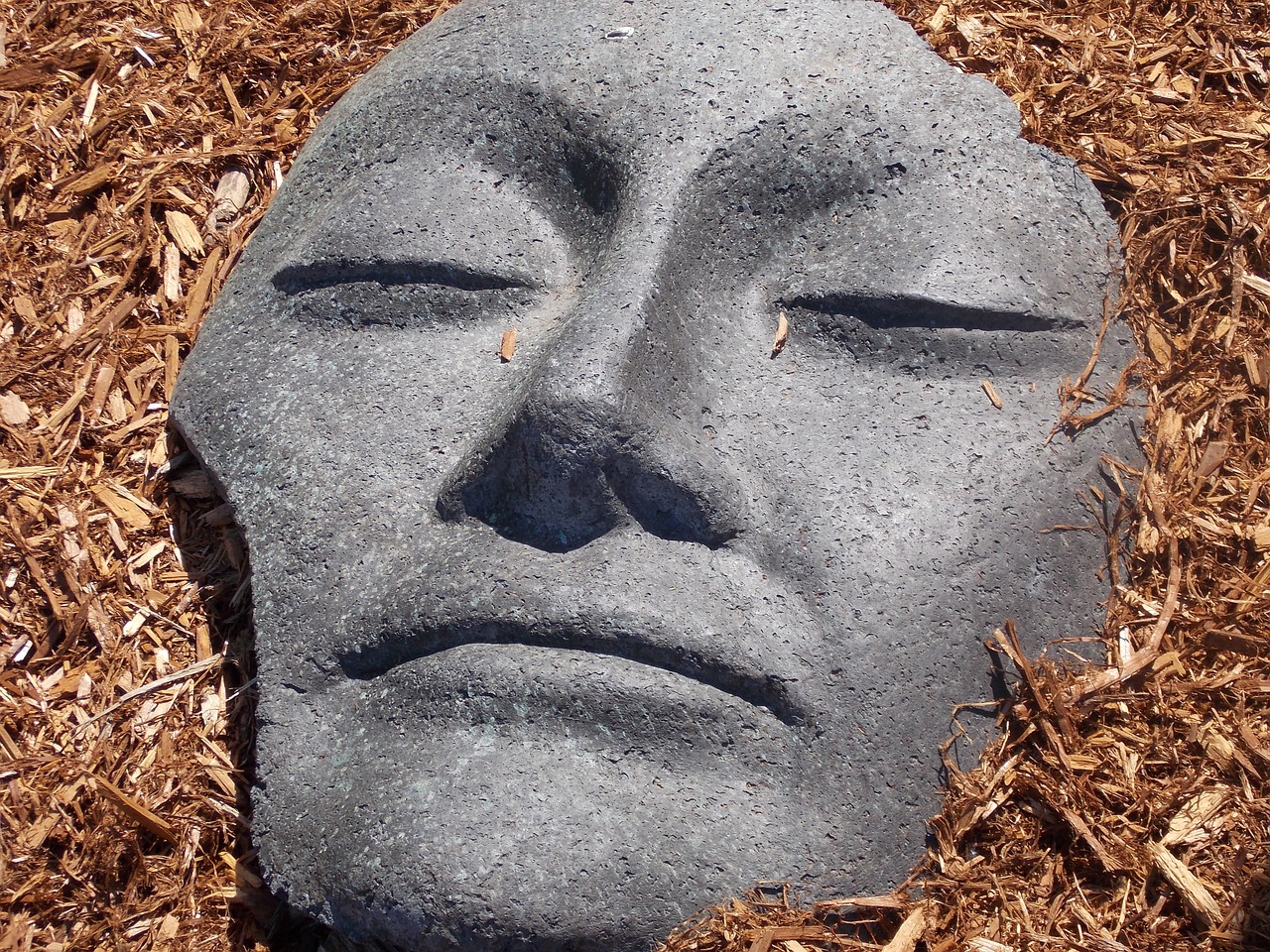 face stone sculpture free photo