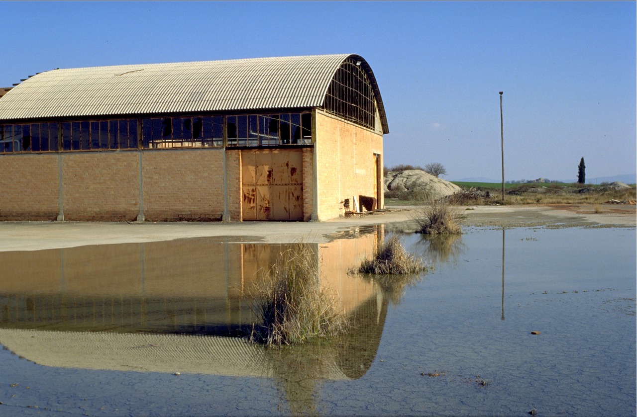 factory hall mirroring water free photo